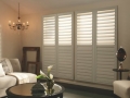 Shutters in white room