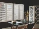 dark room with white shutters