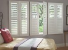 white shutters grey room